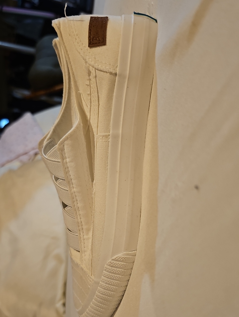 Keds Slip-On Canvas Sneakers in Off-White with Brown Logo Tab